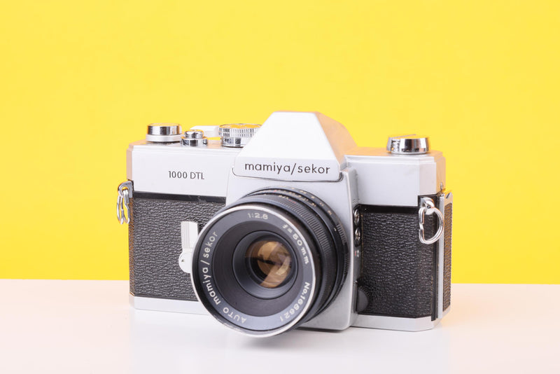 Mamiya Sekor 1000 DTL 35mm Film SLR Camera with Auto Mamiya/Sekor 50mm f/2.8 Lens