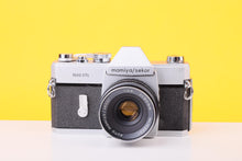 Load image into Gallery viewer, Mamiya Sekor 1000 DTL 35mm Film SLR Camera with Auto Mamiya/Sekor 50mm f/2.8 Lens
