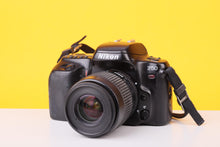 Load image into Gallery viewer, Nikon F50 35mm Film SLR Camera with AF Nikkor 35–80mm Zoom Lens

