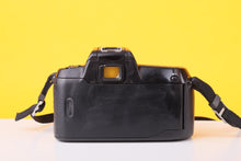 Load image into Gallery viewer, Nikon F50 35mm Film SLR Camera with AF Nikkor 35–80mm Zoom Lens
