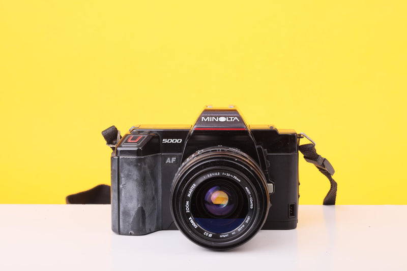 Minolta 5000 AF 35mm Film SLR Camera with Sigma 35–70mm Zoom Lens