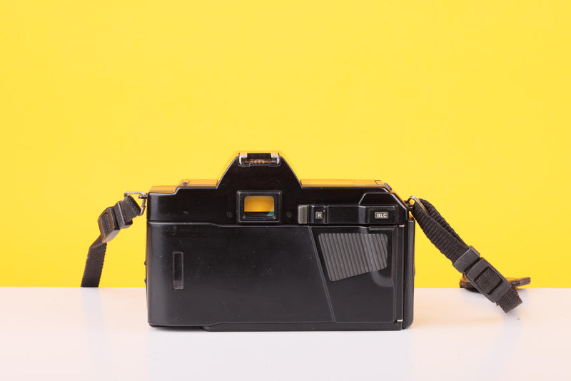 Minolta 5000 AF 35mm Film SLR Camera with Sigma 35–70mm Zoom Lens