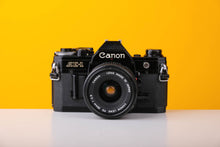 Load image into Gallery viewer, Canon AE-1 35mm Film Camera with Canon 28mm f2.8 Lens

