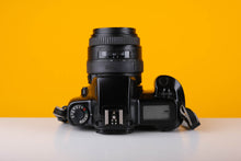 Load image into Gallery viewer, Canon EOS 1000F 35mm SLR Film Camera with Sigma 28-70mm f/3.5 Lens
