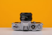 Load image into Gallery viewer, Canon FT QL 35mm Film Camera with Canon 50mm f/2 Lens
