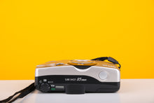 Load image into Gallery viewer, Canon Sure Shot 85 Zoom 35mm Point and Shoot Film Camera
