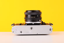 Load image into Gallery viewer, Canon AE-1 35mm SLR Film Camera with 50mm 
