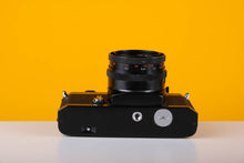 Load image into Gallery viewer, Chinon CE Emotrom 35mm film Camera with 50mm f/2.8 Carl Zeiss Lens

