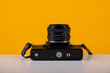 Load image into Gallery viewer, Cosina CS-2 35mm Film Camera with Cosinon 35mm f/2.8 Lens
