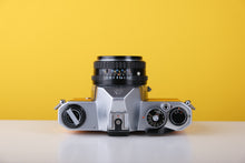 Load image into Gallery viewer, Pentax K1000 35mm Film Camera with Pentax 50mm f/2 Lens in Yellow
