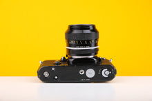 Load image into Gallery viewer, Nikon F2 35mm Film Camera with Nikon 50mm f1.4 Prime Lens
