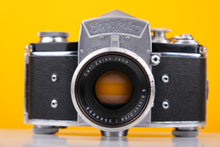Load image into Gallery viewer, Exakta Varex VX 35mm Film Camera with Carl Zeiss Biotar 58mm f/2 Lens
