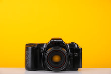 Load image into Gallery viewer, Olympus OM101 35mm SLR Film Camera with 50mm f2 Lens and Manual Adaptor
