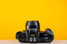Load image into Gallery viewer, Olympus OM101 35mm SLR Film Camera with 50mm f2 Lens and Manual Adaptor
