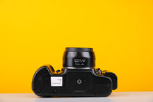 Load image into Gallery viewer, Olympus OM101 35mm SLR Film Camera with 50mm f2 Lens and Manual Adaptor
