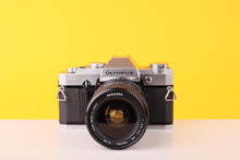 Load image into Gallery viewer, Olympus OM30 Vintage SLR 35mm Film Camera with Miranda 28-70mm f3.5 Zoom Lens
