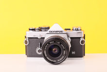 Load image into Gallery viewer, Olympus OM-2n MD 35mm Film Camera with Zuiko 28mm f2.8 Lens
