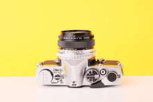 Load image into Gallery viewer, Olympus OM-2n MD 35mm Film Camera with Zuiko 28mm f2.8 Lens

