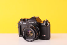 Load image into Gallery viewer, Yashica FX-3 Super 2000 35mm Film Camera with Yashica 50mm f/2 Lens
