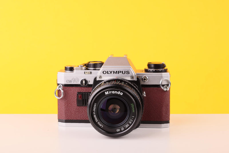 Olympus OM10 35mm Film Camera with Zuiko 28mm f2.8 Prime Lens Burgundy
