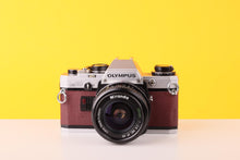 Load image into Gallery viewer, Olympus OM10 35mm Film Camera with Zuiko 28mm f2.8 Prime Lens Burgundy
