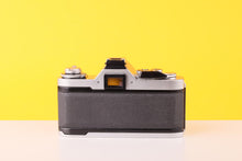 Load image into Gallery viewer, Canon AV-1 35mm Film Camera with Canon FD 35-70mm f/3.5 Prime Lens
