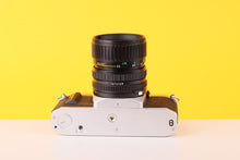 Load image into Gallery viewer, Canon AV-1 35mm Film Camera with Canon FD 35-70mm f/3.5 Prime Lens

