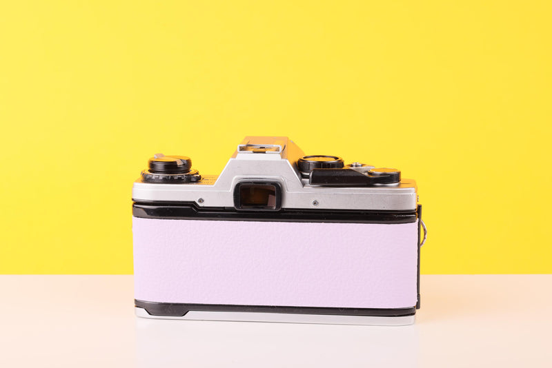 Olympus OM10 35mm SLR Film Camera with Zoom LENS 35-70mm f3.5 Lens in Lilac