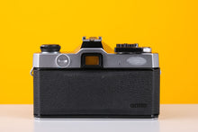 Load image into Gallery viewer, Fujica ST605n SLR 35mm Film Camera with Cosina 28-70mm f/4 Macro Lens
