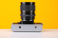 Load image into Gallery viewer, Fujica ST605n SLR 35mm Film Camera with Cosina 28-70mm f/4 Macro Lens
