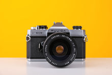 Load image into Gallery viewer, Fujica ST605n SLR 35mm Film Camera with Cosina 28-70mm f/4 Macro Lens
