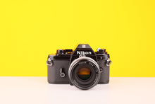 Load image into Gallery viewer, Nikon EM 35mm Film Camera with Nikon 50mm f/1.8 Lens

