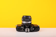 Load image into Gallery viewer, Olympus OM2 Black 35mm Film Camera with Zuiko  50mm f/1.4 Lens
