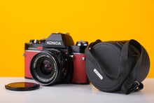 Load image into Gallery viewer, Konica Autoreflex TC 35mm SLR Film Camera with Konica Hexanon 28mm f3.5 Prime Lens in Red
