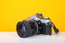 Load image into Gallery viewer, Minolta XG2 35mm Film Camera with Tamron 36-70mm f/3.5-4.5 Zoom Lens
