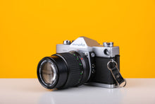 Load image into Gallery viewer, Minolta SR-7 35mm Film Camera with Minolta 135mm f/3.5 Lens
