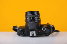 Load image into Gallery viewer, Minolta X-370s with Minolta 50mm f1.7 lens
