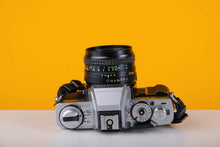 Load image into Gallery viewer, Minolta XG-1  35mm Film Camera with Minolta 50mm f/1.7 Lens
