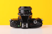 Load image into Gallery viewer, Minolta X-300 35mm Film Camera with Vivitar 28mm
