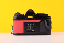 Load image into Gallery viewer, Minolta X-700 35mm SLR Film Camera with Minolta MD 50mm f1.7 Lens
