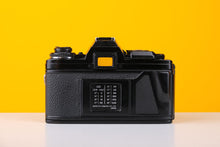 Load image into Gallery viewer, Minolta X-700 35mm Film SLR Camera with Minolta 45mm f/2 Lens

