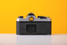 Load image into Gallery viewer, Nikon FM 35mm Film Camera with Nikkor 50mm f1.4 Lens
