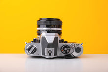 Load image into Gallery viewer, Nikon FM 35mm Film Camera with Nikkor 50mm f1.4 Lens
