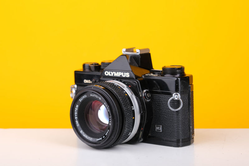 Olympus OM-2n MD Black 35mm Film Camera with Zuiko 50mm f/1.8 Lens