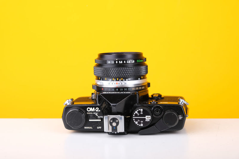 Olympus OM-2n MD Black 35mm Film Camera with Zuiko 50mm f/1.8 Lens
