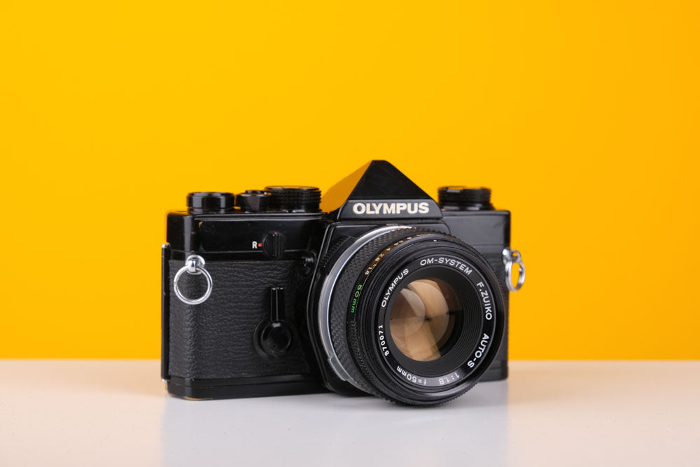 Olympus OM-1n MD Black 35mm Film Camera with Zuiko 50mm f/1.4 Lens