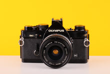 Load image into Gallery viewer, Olympus OM-2n MD Black 35mm Film Camera with Zuiko 28mm f/2.8
