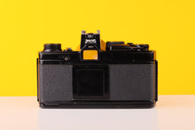 Load image into Gallery viewer, Olympus OM-2n MD Black 35mm Film Camera with Zuiko 50mm f/1.4 
