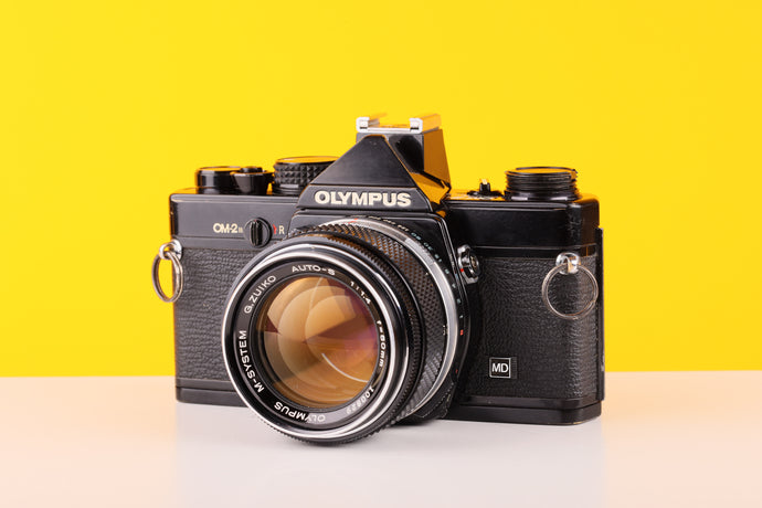 Olympus OM-2n MD Black 35mm Film Camera with Zuiko 50mm f/1.4 Lens