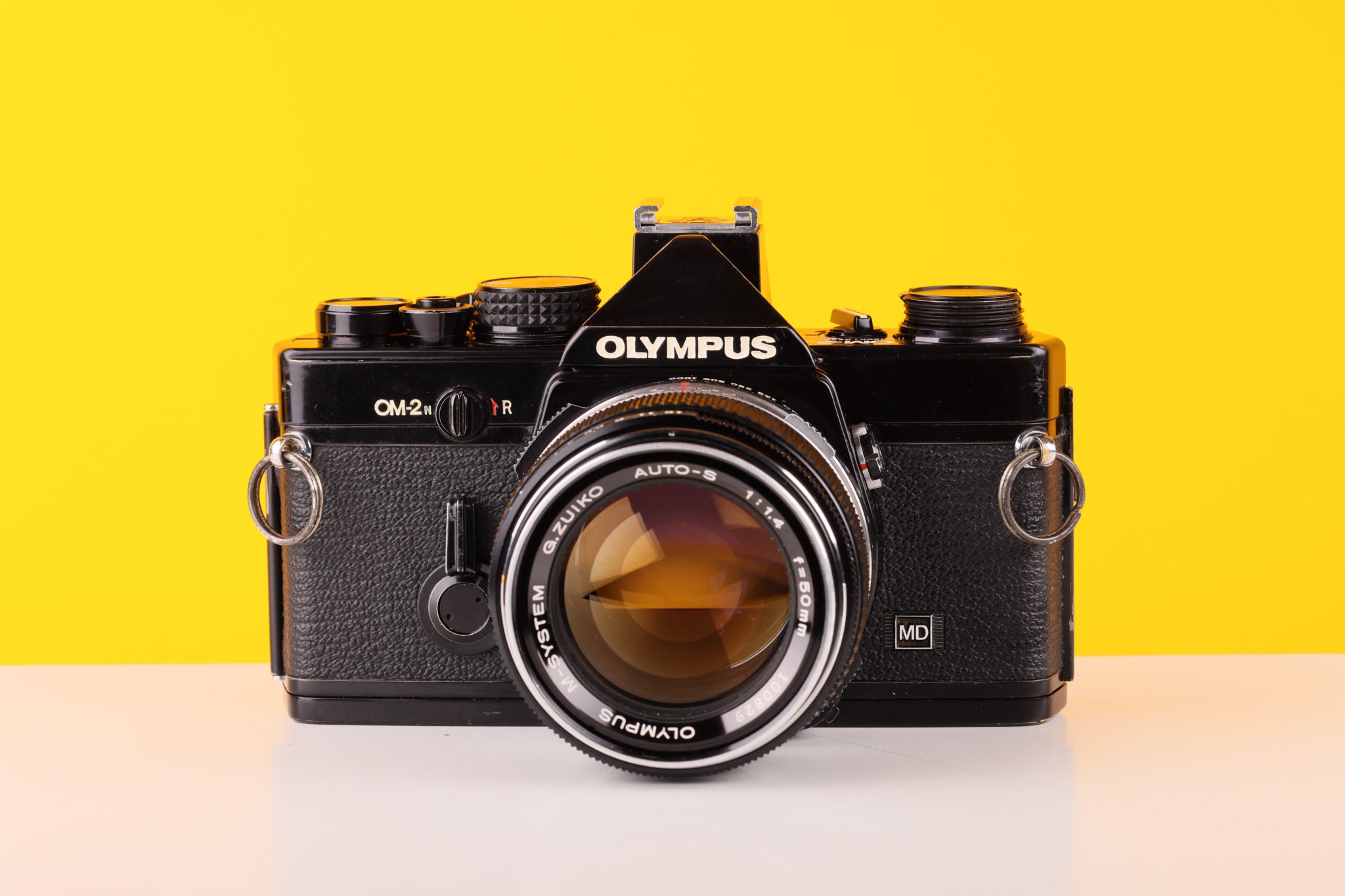 Olympus OM-2n MD Black 35mm Film Camera with Zuiko 50mm f/1.4 Lens